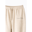 Жіночі брендовані штани-джогери з бежевого меланжевого трикотажу