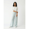 Льняні штани палаццо у бірюзово-блакитну акварельну смужку