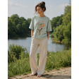 Футболка oversize фісташкового кольору з букетом тюльпанів