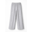 Жіночі лляні брюки в біло-сіру смужку Жіночі лляні брюки в біло-сіру смужку
